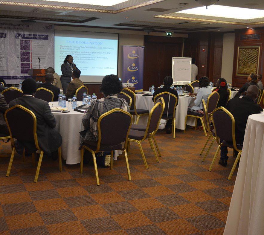 Delegates in discussion during an EII workshop